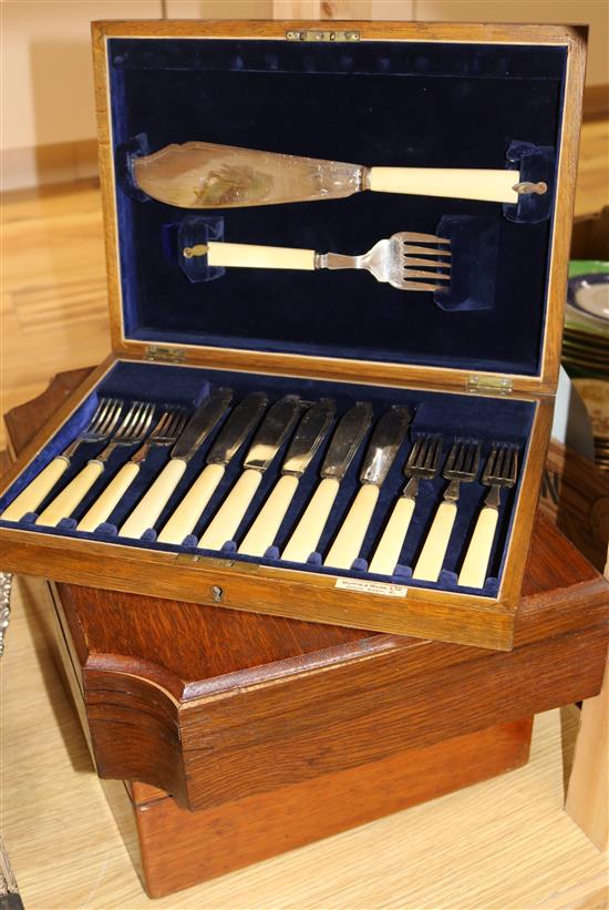 A set of six plated fish knives and forks and servers, and two canteen boxes (empty)